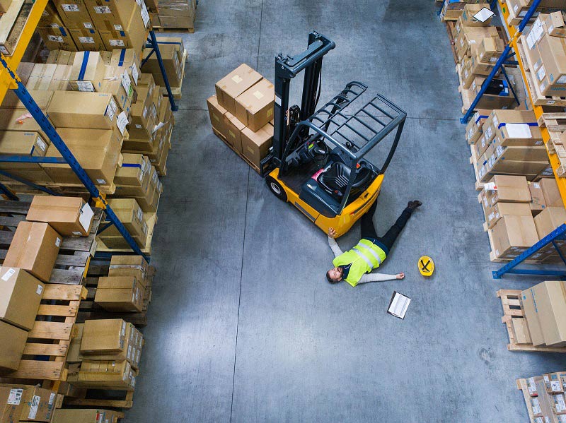 How Manufacturers Can Operate Safely and Productively During the COVID-19 Crisis 2 Worker on the floor after falling off forklift